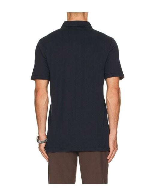 Late Travis Mathew de hombre de color Black