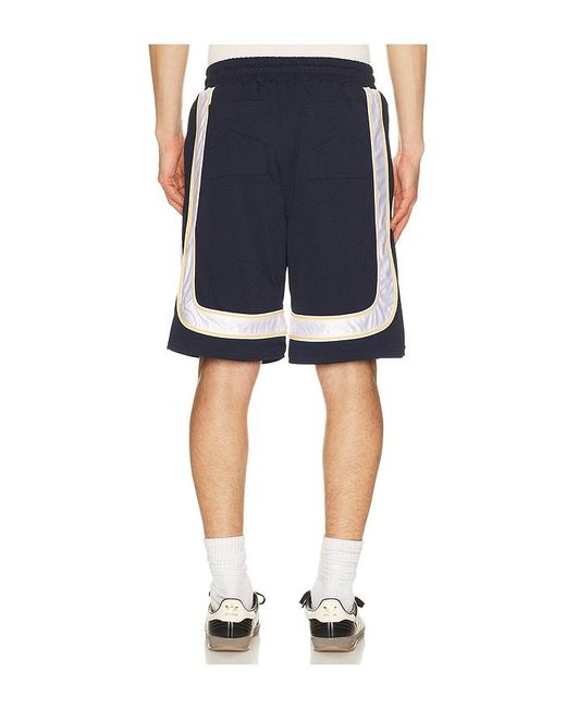 Rhude Blue Mesh Piping Baggy Track Shorts for men