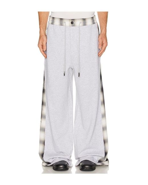 Feng Chen Wang White Patched Panel Jersey Trousers for men