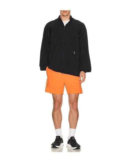 Malbon Orange Performance Poly Tech Short for men