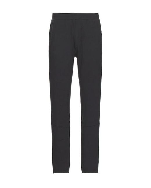 Alo Yoga Black Conquer React Performance Pant for men