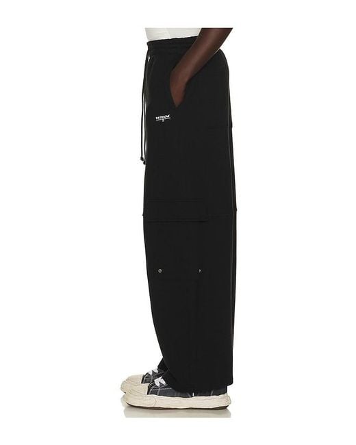 we11done Black Wide Fit Cargo Pants for men