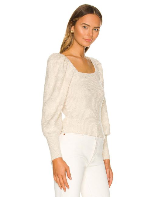 white sparkly sweater