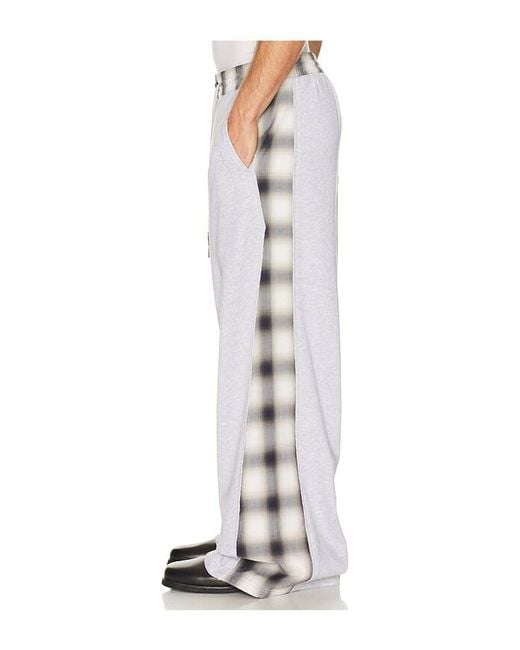 Feng Chen Wang White Patched Panel Jersey Trousers for men