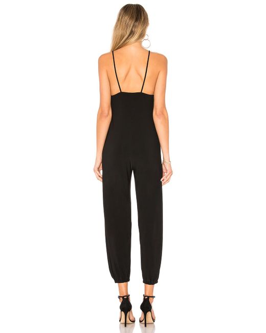 Norma Kamali Slip Jog Jumpsuit in Black - Lyst