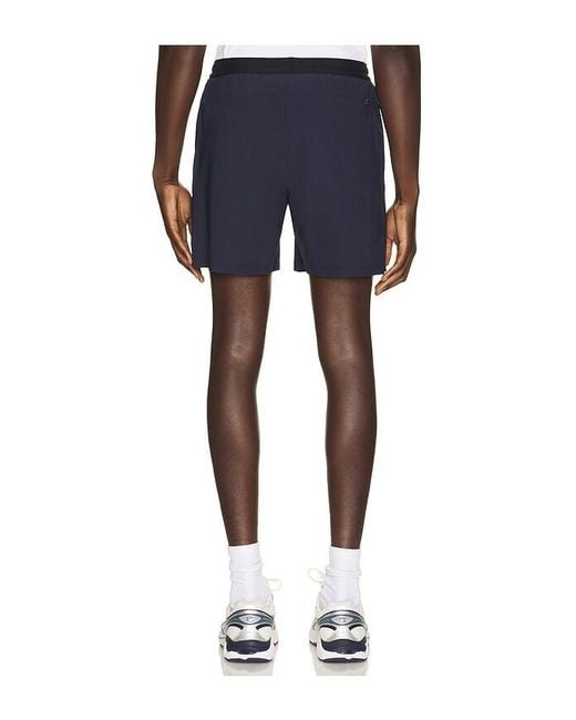 Beyond Yoga Blue Warplite Range Lined Short for men