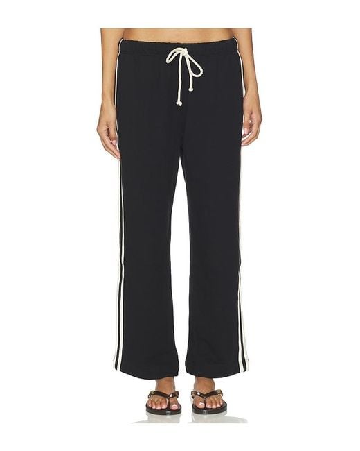 DONNI. Black The Eco-Terry Stripe Crop Pant