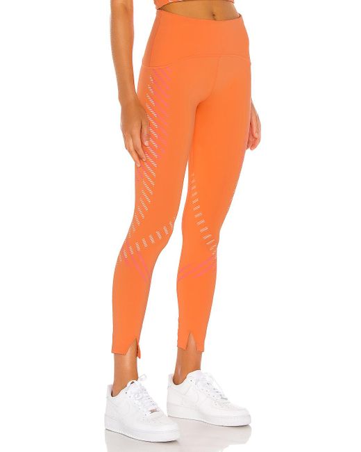 orange nike tights