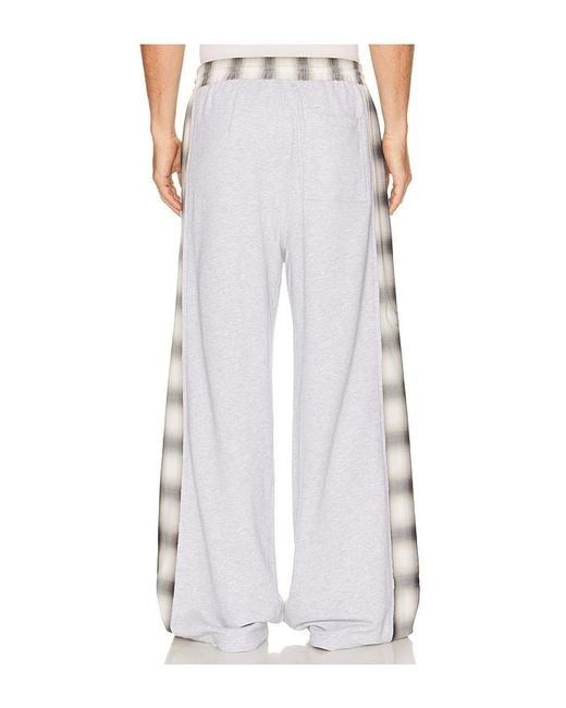 Feng Chen Wang White Patched Panel Jersey Trousers for men
