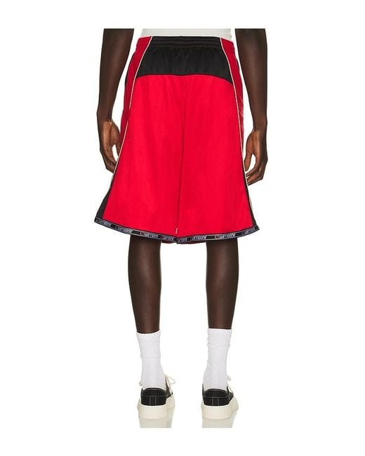 we11done Red Sporty Football Jersey Shorts for men