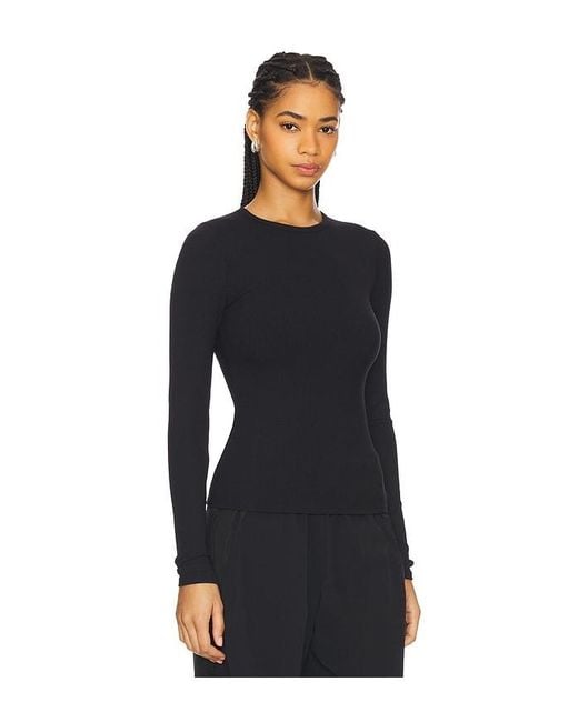 Alo Yoga Ribbed Modal Long Sleeve Top in Black | Lyst UK