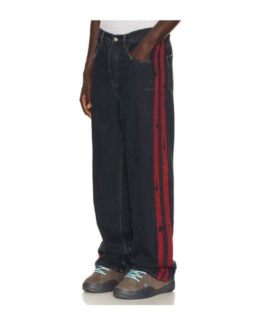 NAHMIAS Black Destroyed Denim Track Pant for men