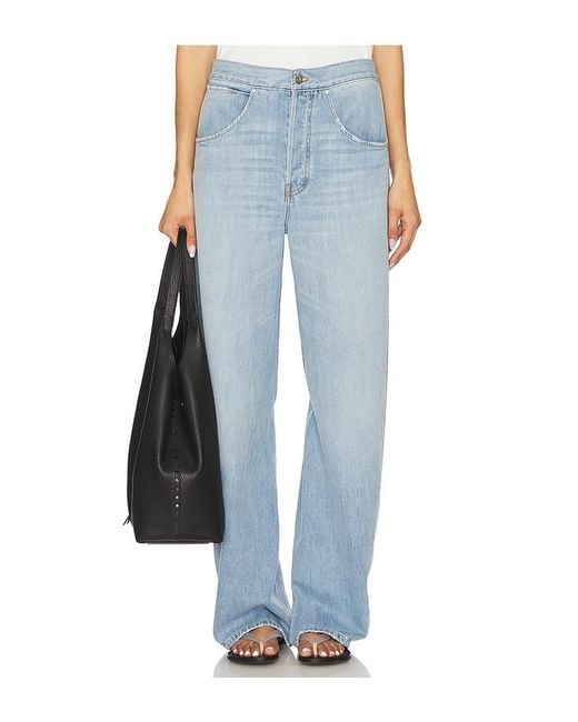 Lovers + Friends Blue Light Engine Low Rise Twist Seam Jeans