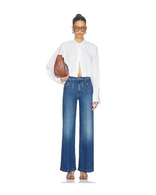 Mother Blue The Stashed Hustler Roller Sneak Jeans
