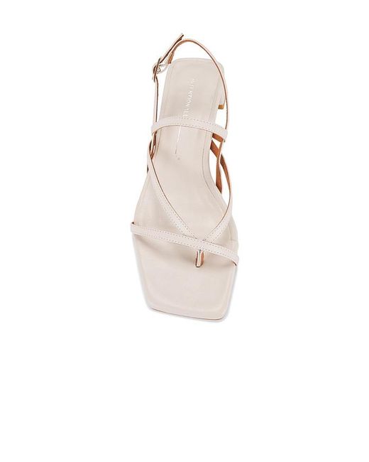 INTENTIONALLY ______ Natural Pup Sandal