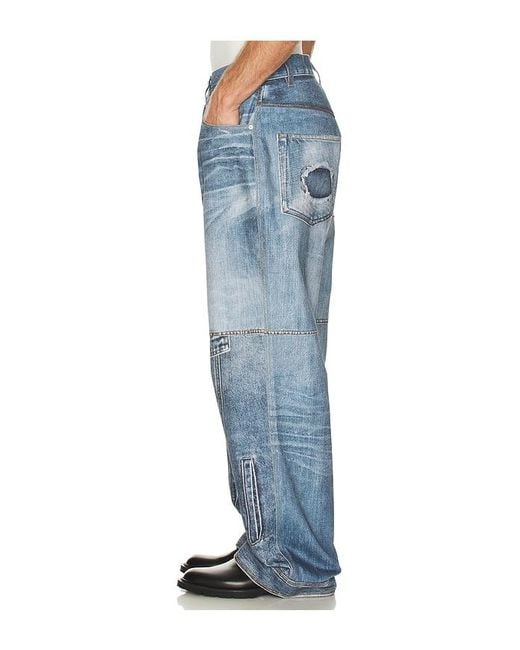 ANDERSSON BELL Blue Custom-Like Printed Denim Pants for men