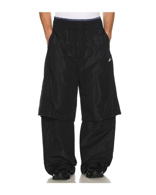 we11done Black Triple Layered Track Pants for men