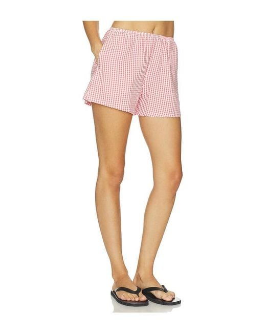 DONNI. Pink X Revolve The Cotton Gingham Tap Short