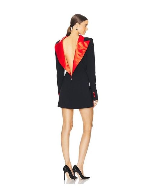 Black dress with red blazer top