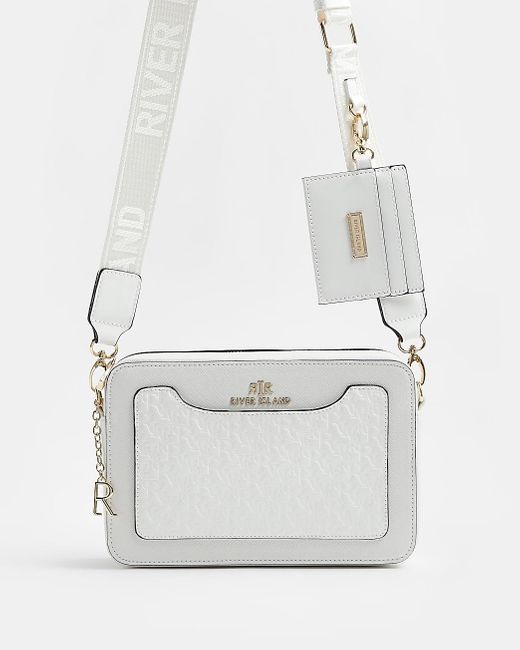 River Island Ri Monogram Embossed Cross Body Bag in White