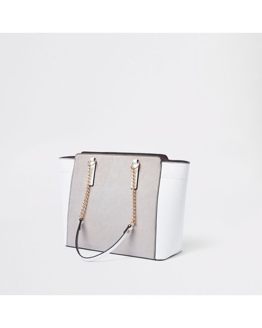 Black winged chain handle tote clearance bag
