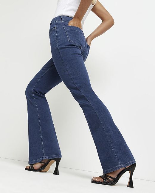 River Island Petite Blue Mid Rise Flared Jeans | Lyst