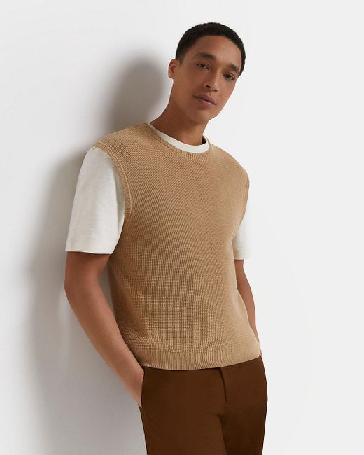 brown sleeveless jumper