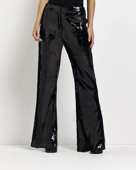 River Island Petite Black Sequin Flared Trousers | Lyst