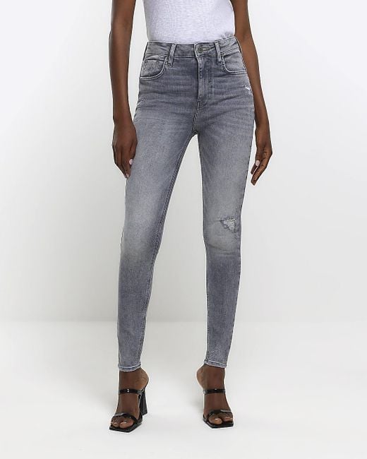 River Island Ripped High Waisted Super Skinny Jeans in Blue | Lyst