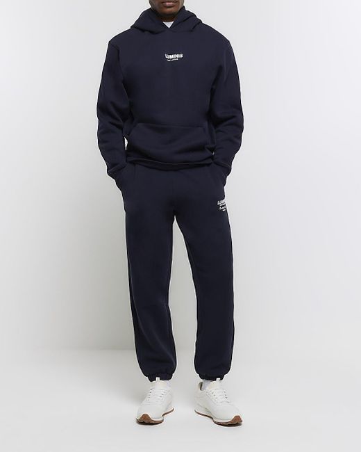 River Island Blue Navy Regular Fit Graphic Tracksuit Joggers for men