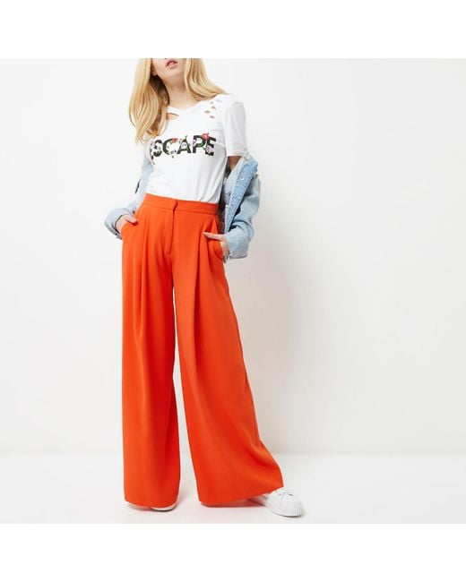 Synthetic Orange Wide Leg Trousers | Lyst