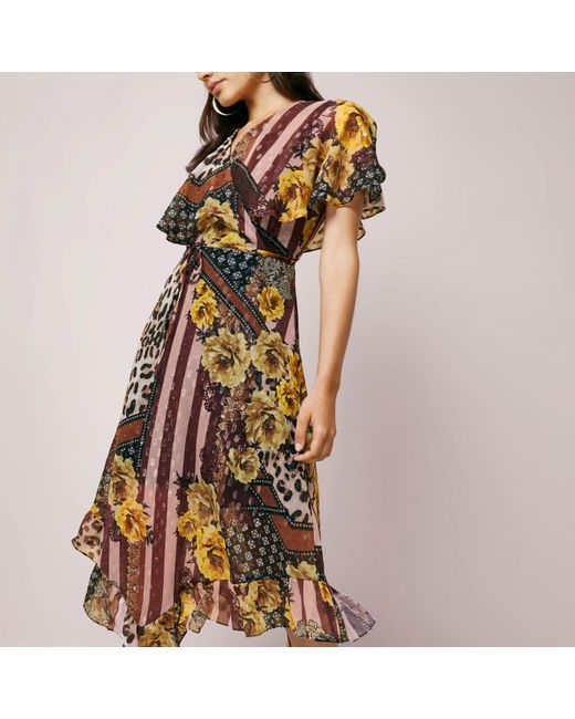asymmetric hem tassel floral printed cape