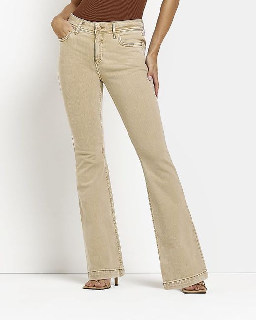 River Island Petite Beige Mid Rise Flared Jeans in Natural | Lyst UK