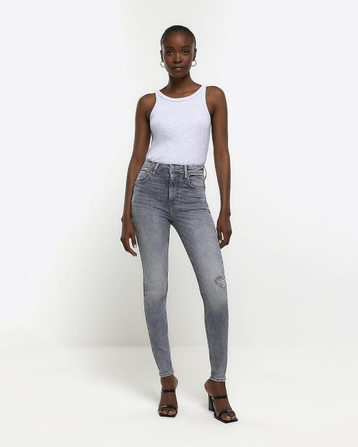 River Island Ripped High Waisted Super Skinny Jeans in Blue | Lyst