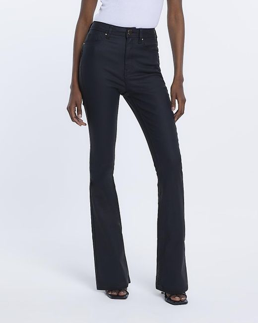 River Island Black Coated High Waisted Flared Jeans in Blue | Lyst