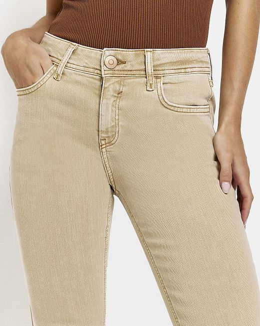 River Island Petite Beige Mid Rise Flared Jeans in Natural | Lyst
