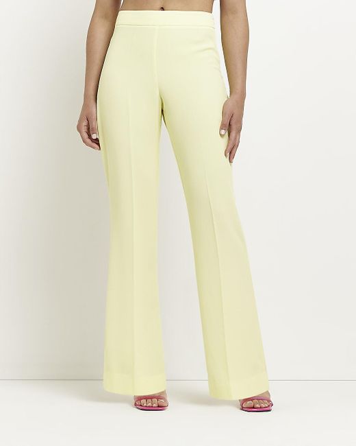 River Island Petite Split Flare Trousers in Yellow | Lyst