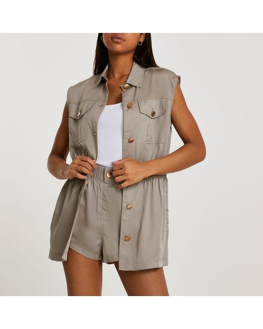 beige sleeveless jacket