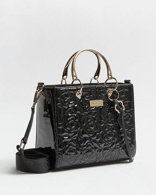 river island black embossed bolsa
