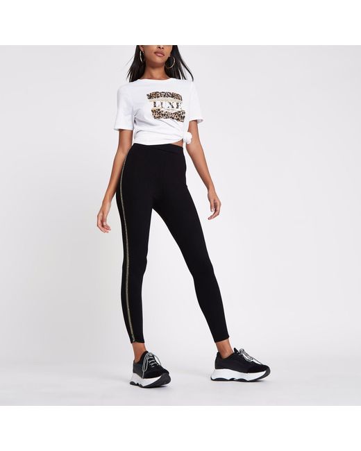 Black Sequin Stripe Side leggings | Lyst UK