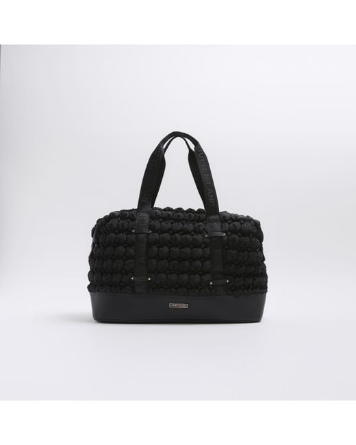 Black quilted travel bag clearance