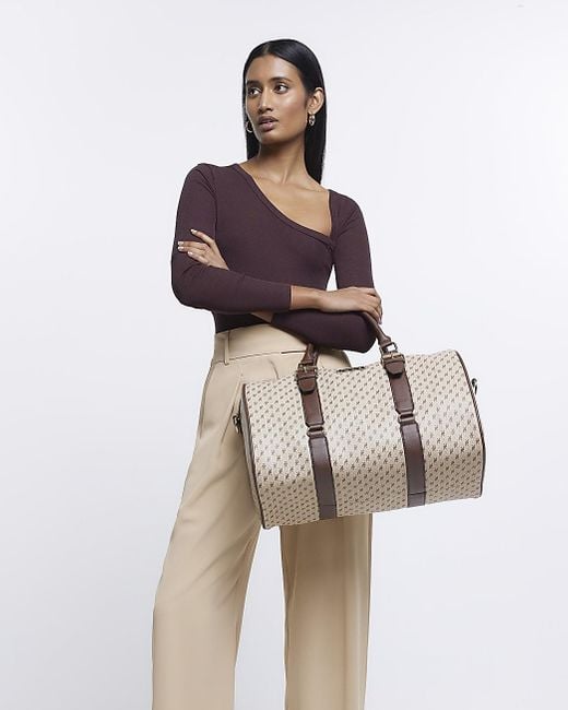 Beige ri monogram weekend duffle bag new arrivals