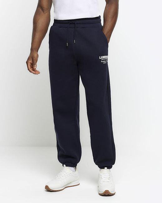 River Island Blue Navy Regular Fit Graphic Tracksuit Joggers for men