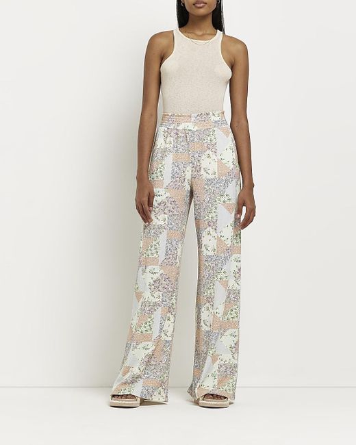 River Island Orange Floral Shirred Palazzo Trousers Lyst Uk