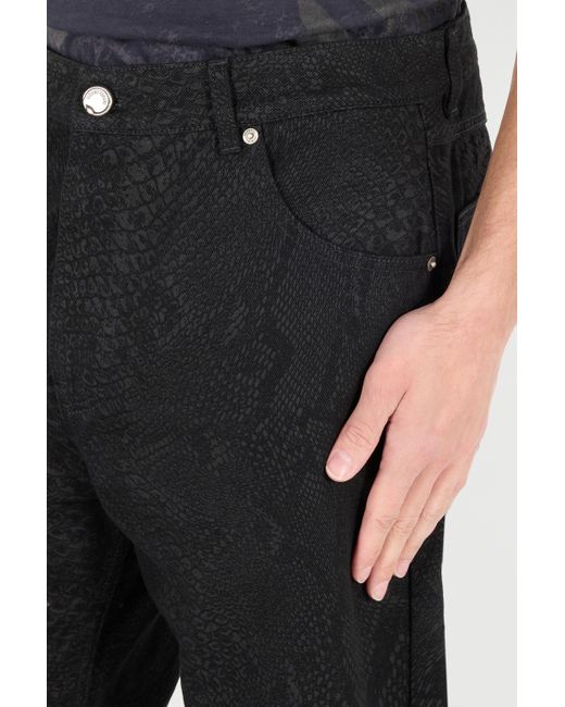 Pantalones Con Estampado Pitón Roberto Cavalli de hombre de color Black