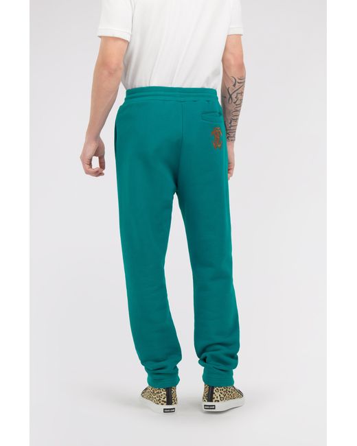 Roberto Cavalli Green Trousers With Fang Detail for men