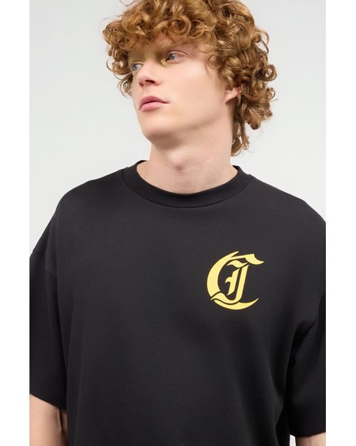 Roberto Cavalli Black T-Shirt With Floral And Tropical Bird Print for men
