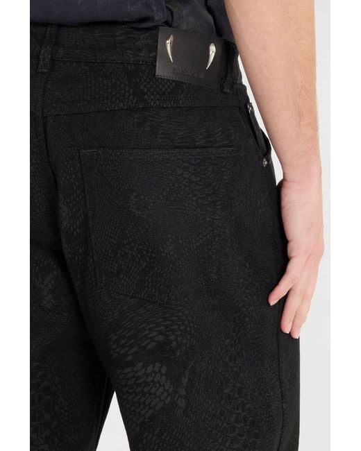 Pantalones Con Estampado Pitón Roberto Cavalli de hombre de color Black