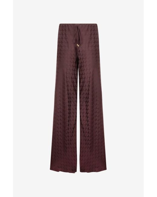 Pantaloni Loose Con Monogram Mirror Snake di Roberto Cavalli in Purple