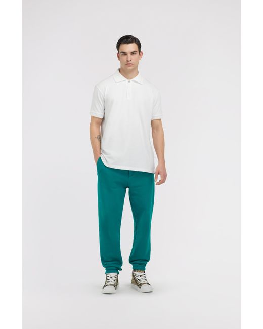 Roberto Cavalli Green Trousers With Fang Detail for men